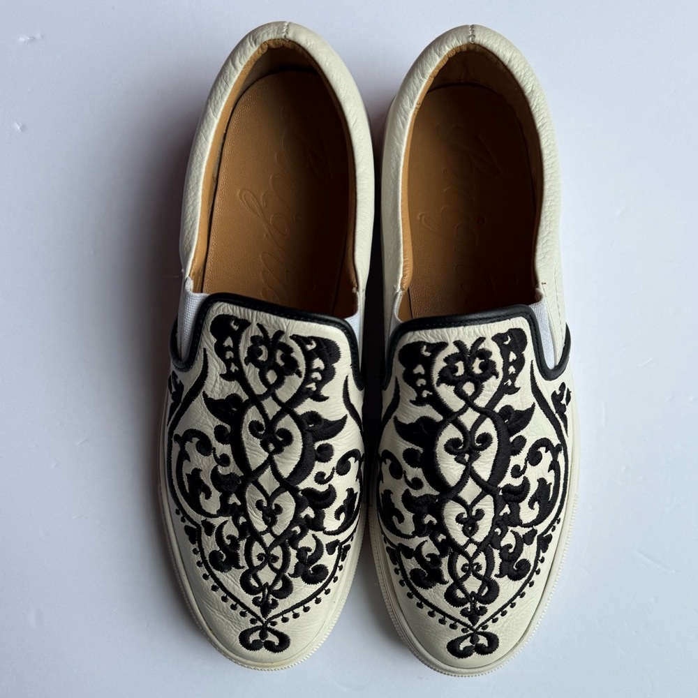 Brighton Black and White Embroidered Slip-Ons